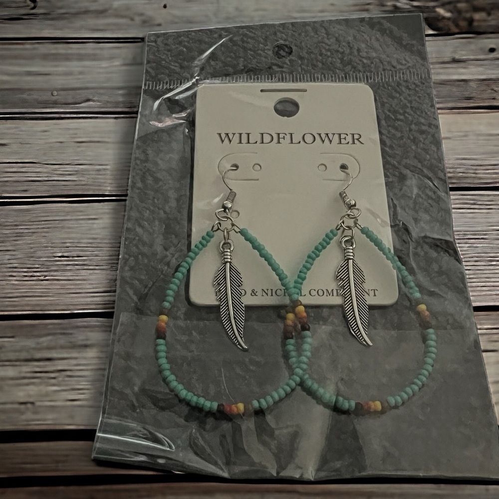 Turquoise beaded tear shape earrings with small silver feather